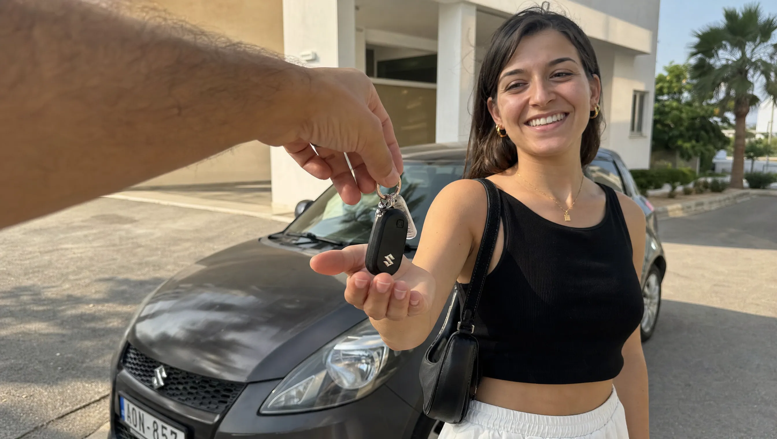 Handing over car keys to a new owner in Cyprus